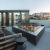 a large outdoor fireplace with rooftop views