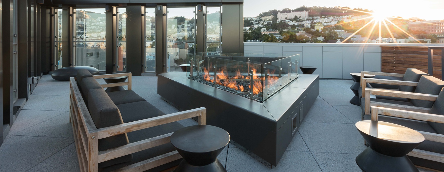 a patio with a city in the background